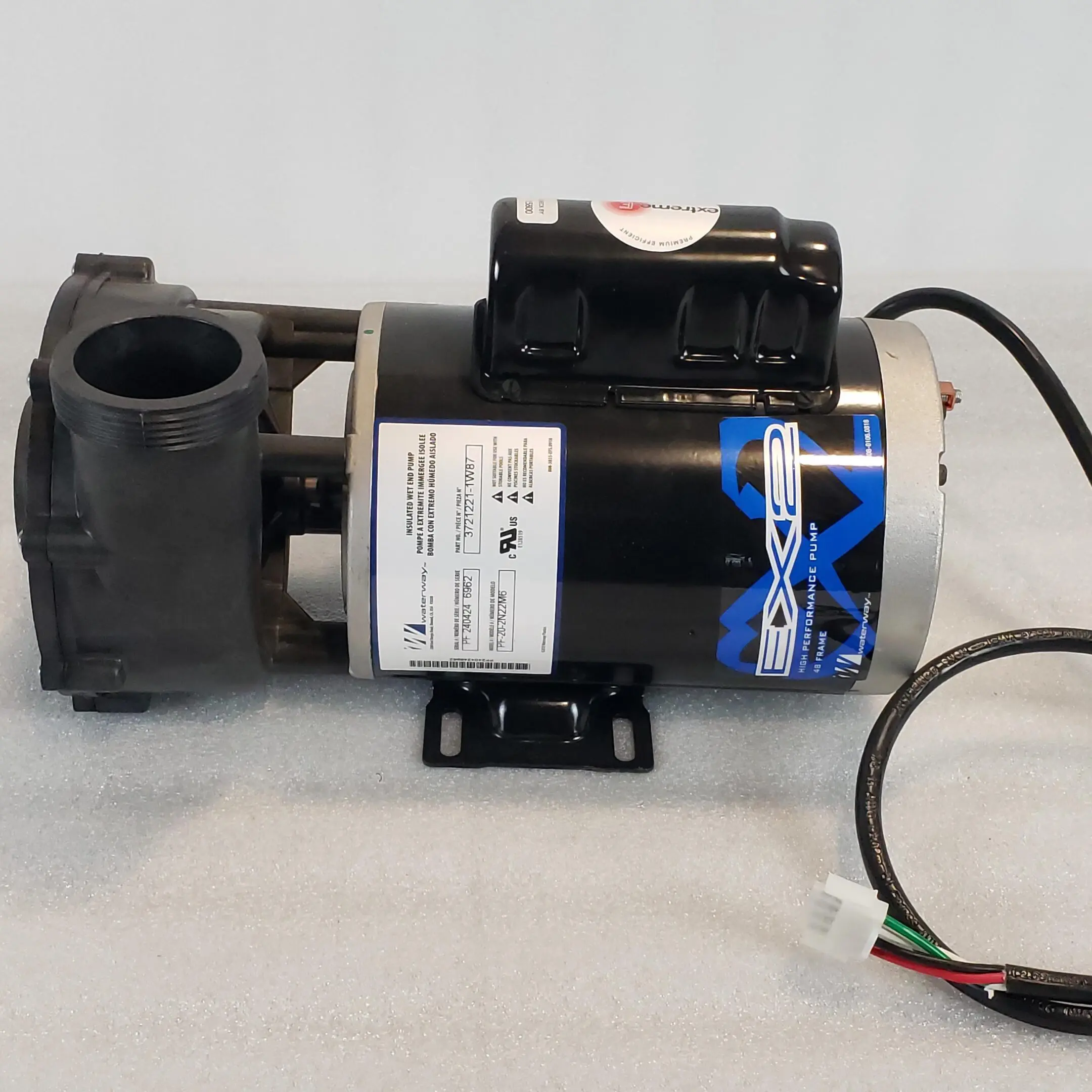 A pump that is sitting on the ground.