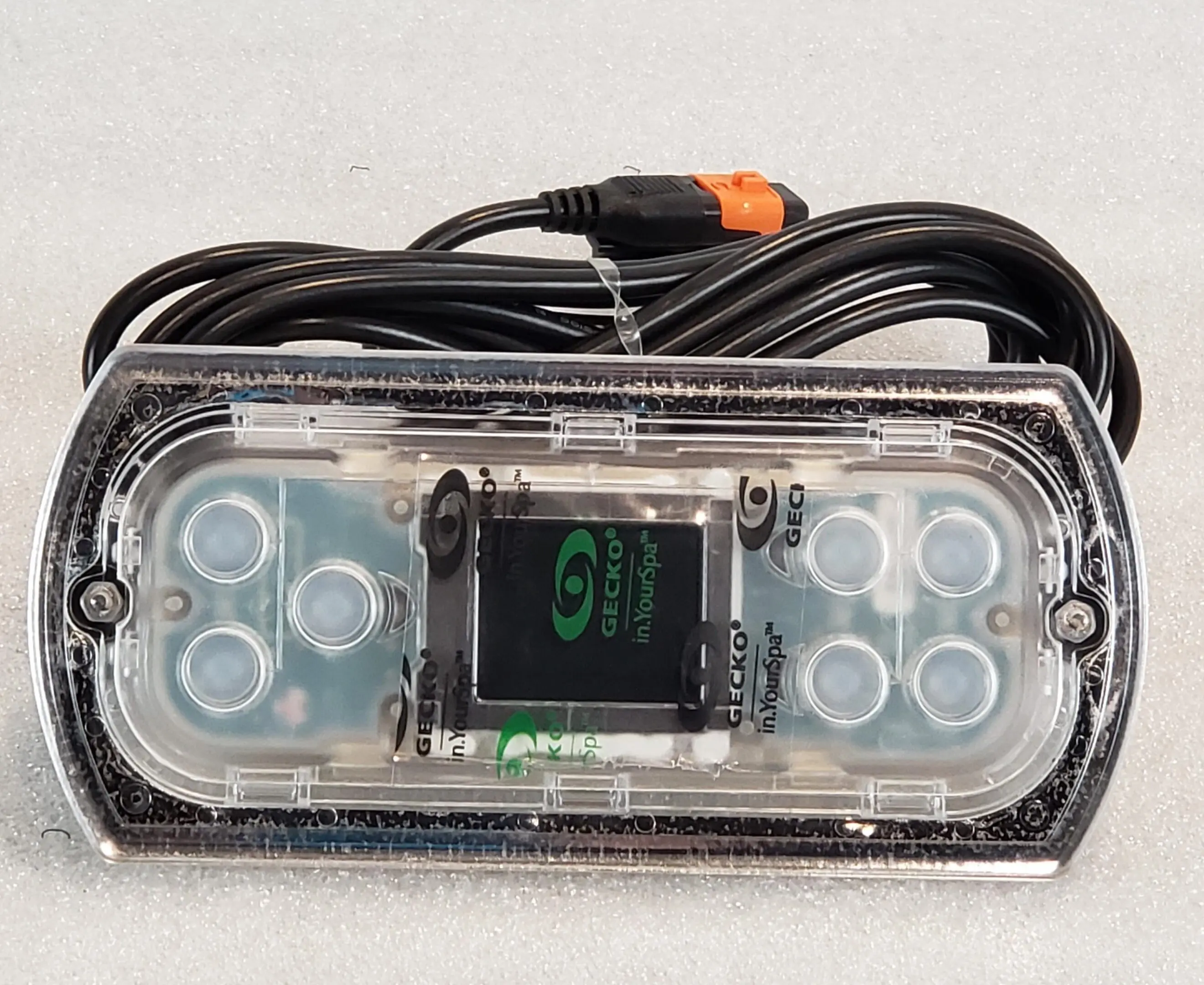 A close up of the back side of an emergency light