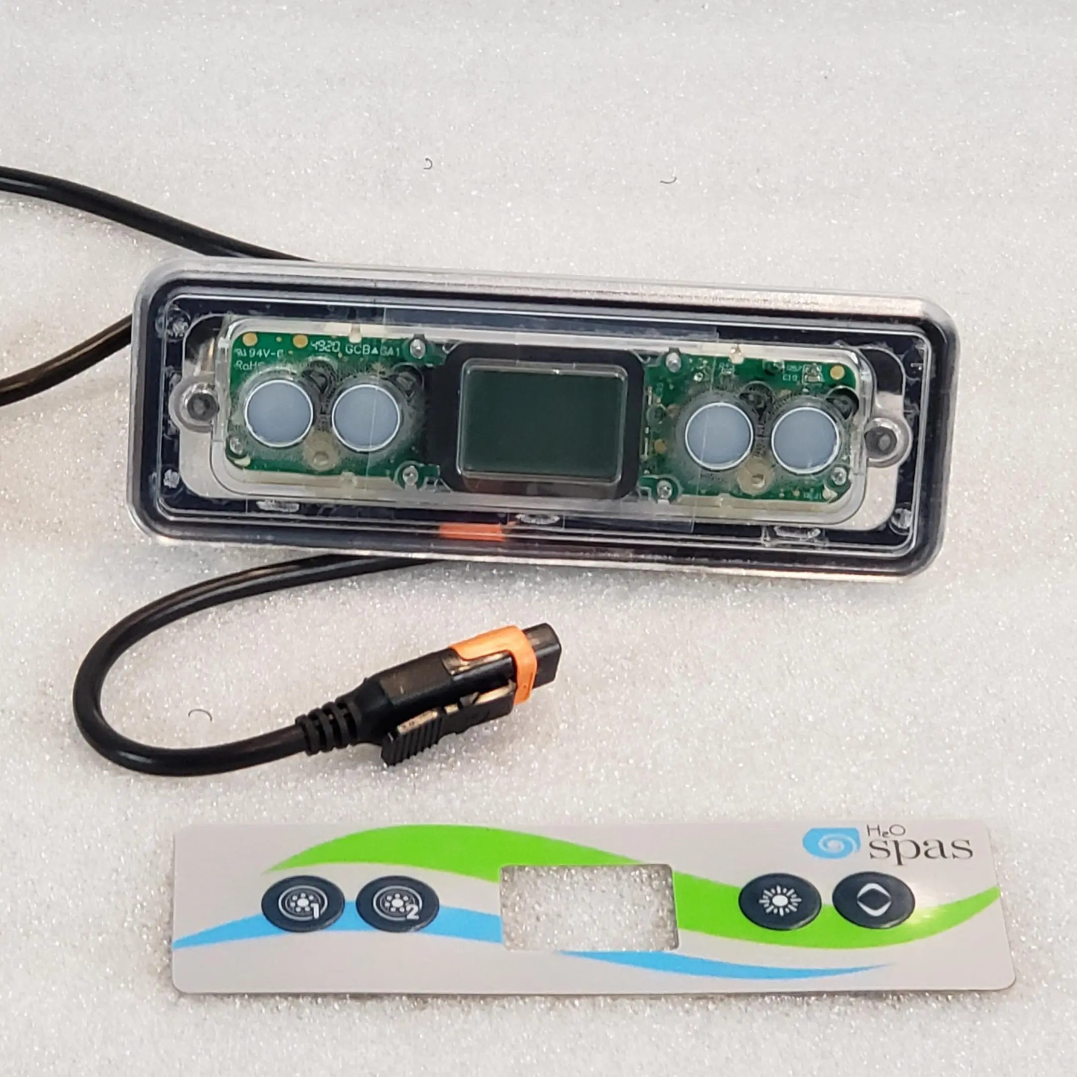 A car light with the switch on and an image of a truck.