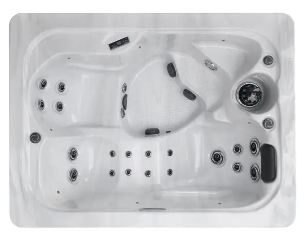 A white spa tub with black knobs and wheels.