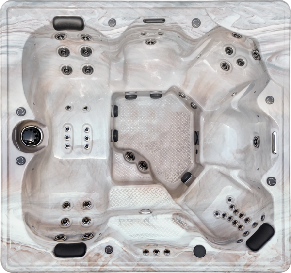 A white spa with black knobs and a large center section.