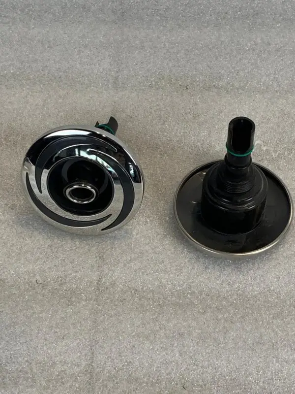 A pair of knobs that are sitting on the floor.