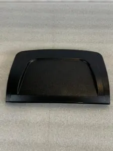 A black tray sitting on top of a table.