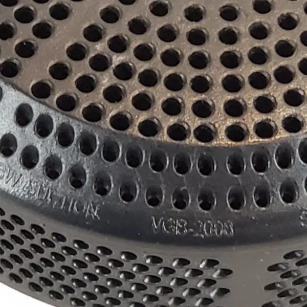 A close up of the bottom of a speaker