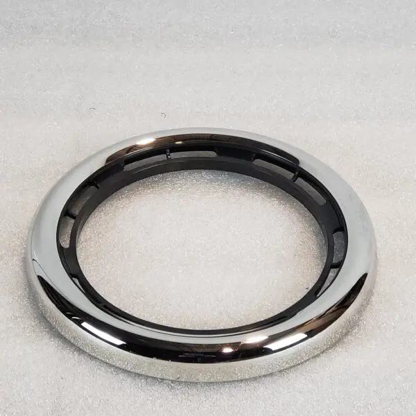 A chrome ring with a black center.
