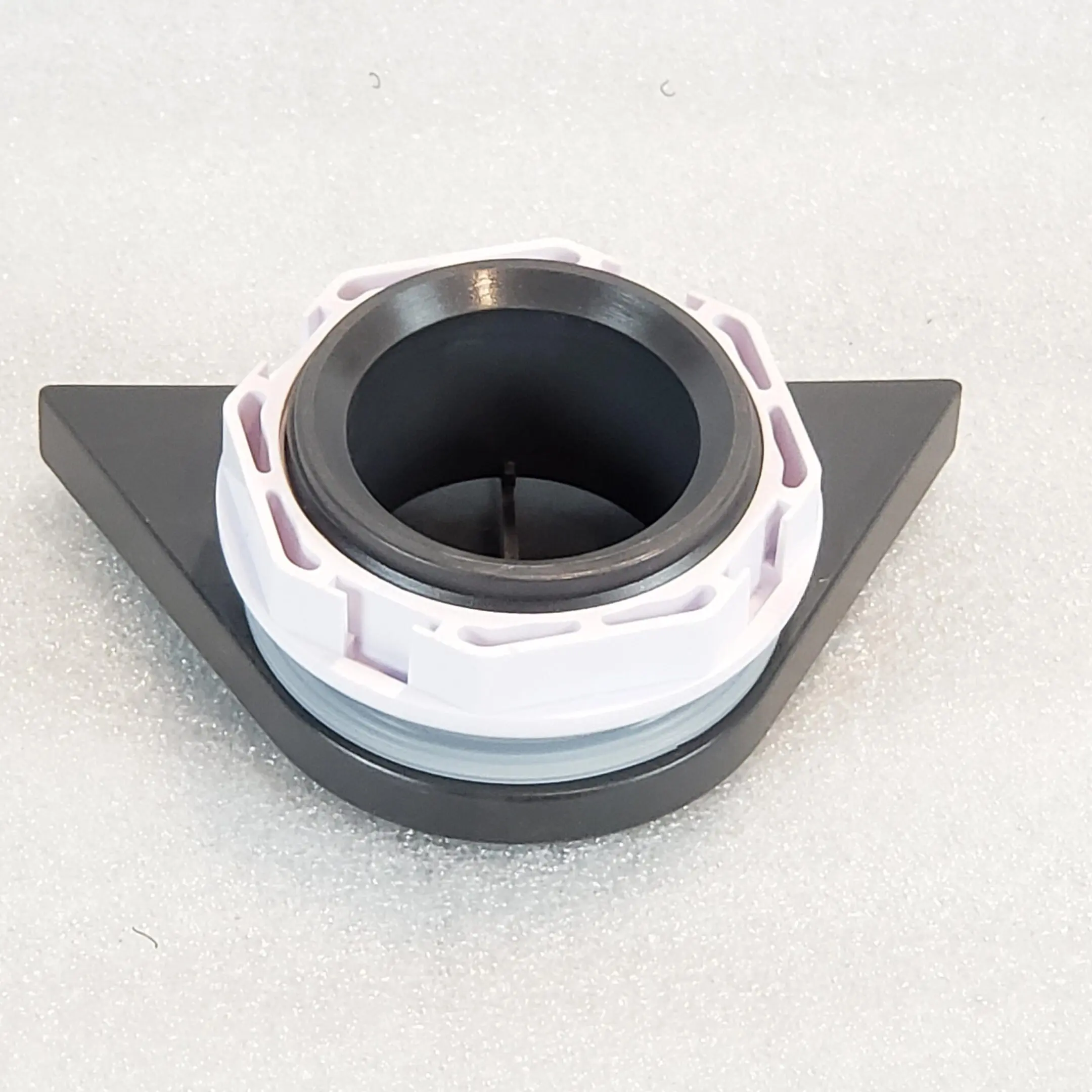 A white and black object sitting on top of a table.