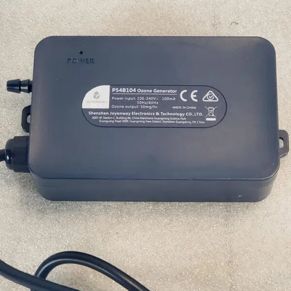 A black box with a cord attached to it.