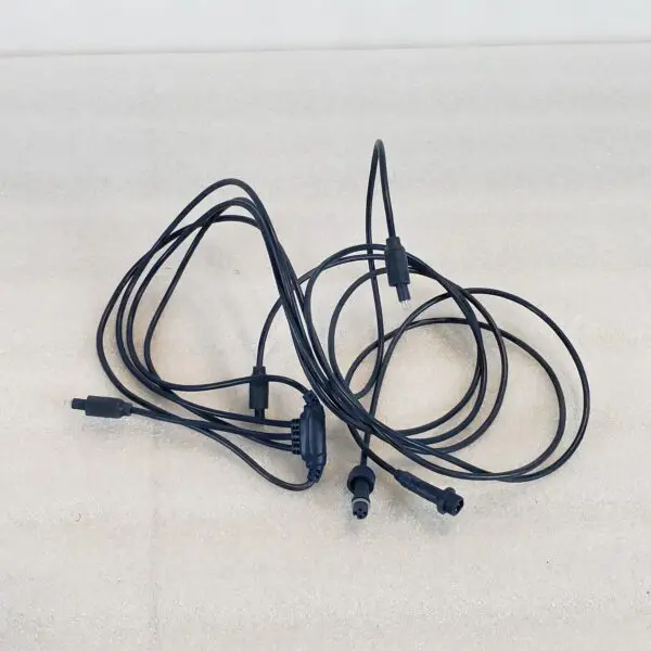 A bunch of wires that are on the ground