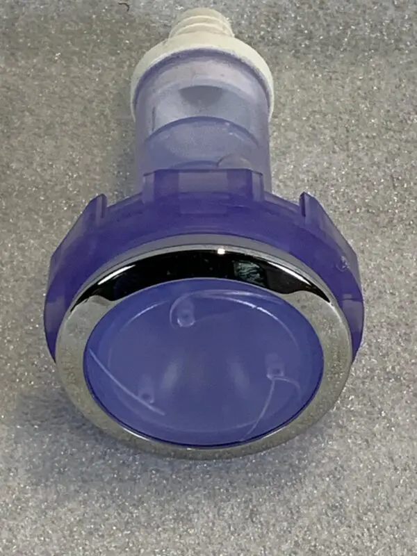 A purple and silver plastic object sitting on top of a floor.