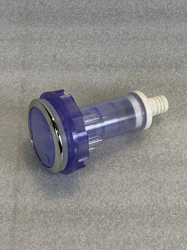 A blue and white light bulb sitting on top of a table.