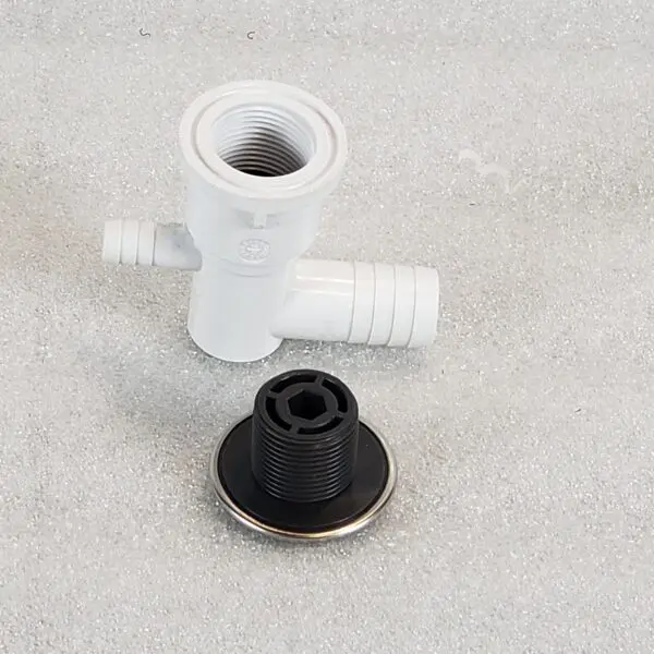 A black and white picture of a water faucet.