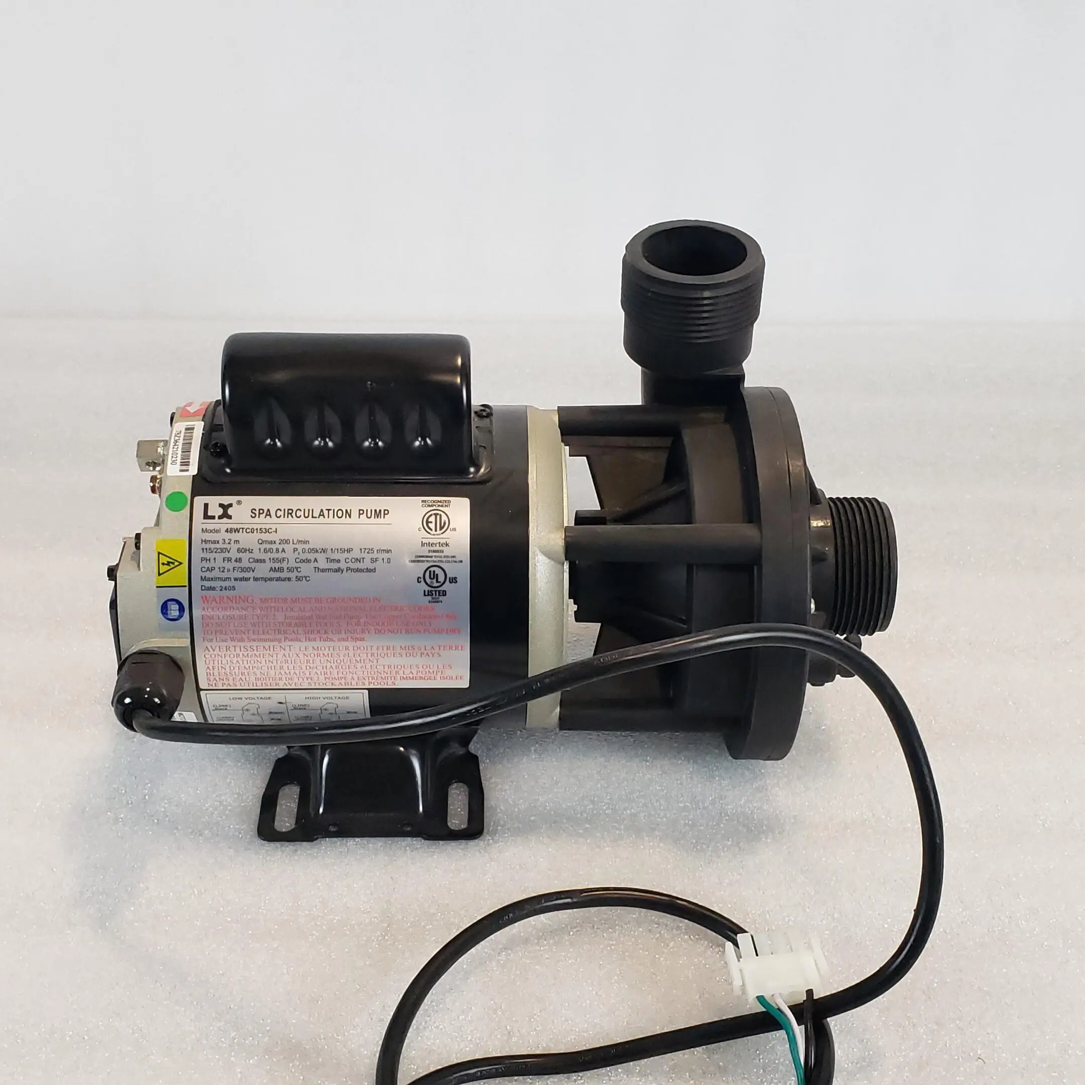 A pump that is sitting on the ground.