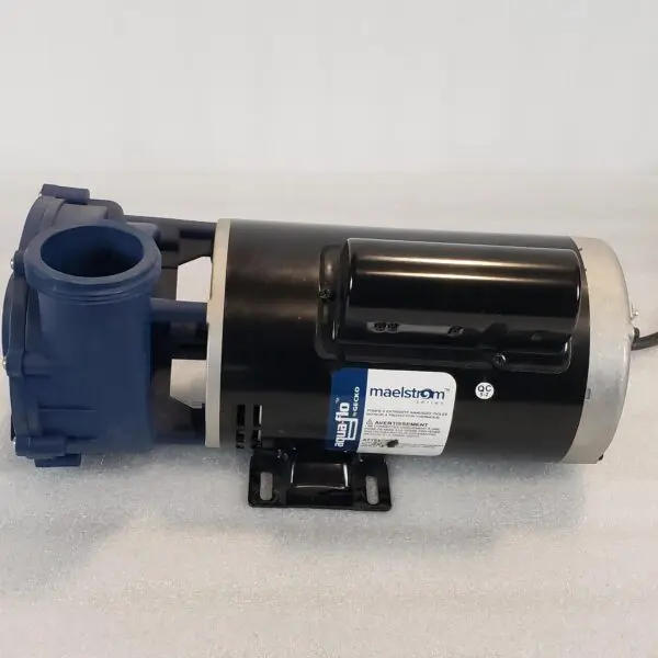 A pump that is sitting on the ground.