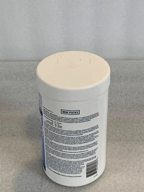 A white container with a lid on it.