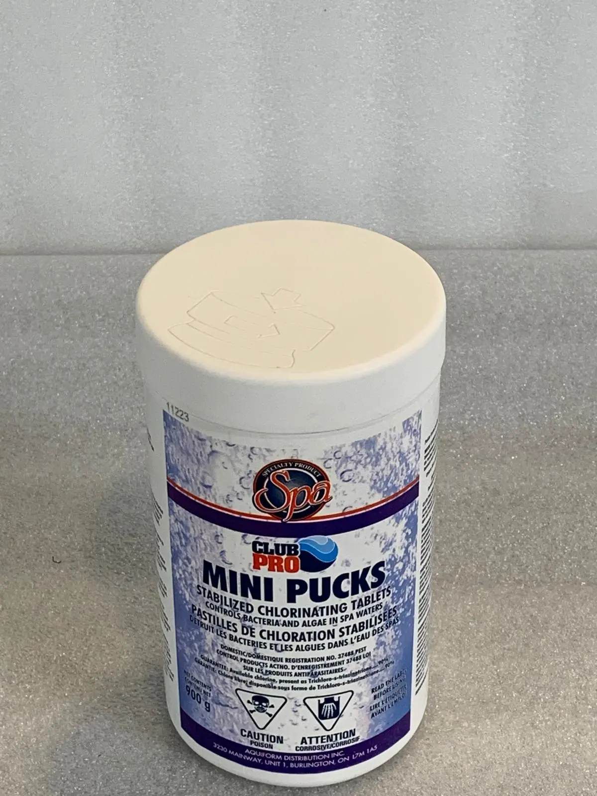 A can of mini pucks is sitting on the counter.