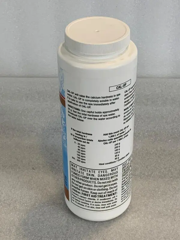 A bottle of milk with the expiration date on it.