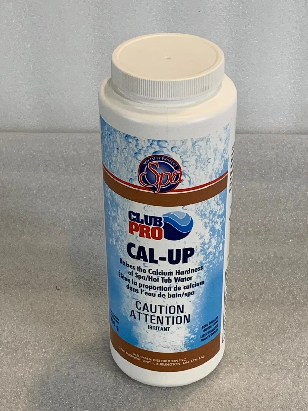 A bottle of cal-up is sitting on the counter.