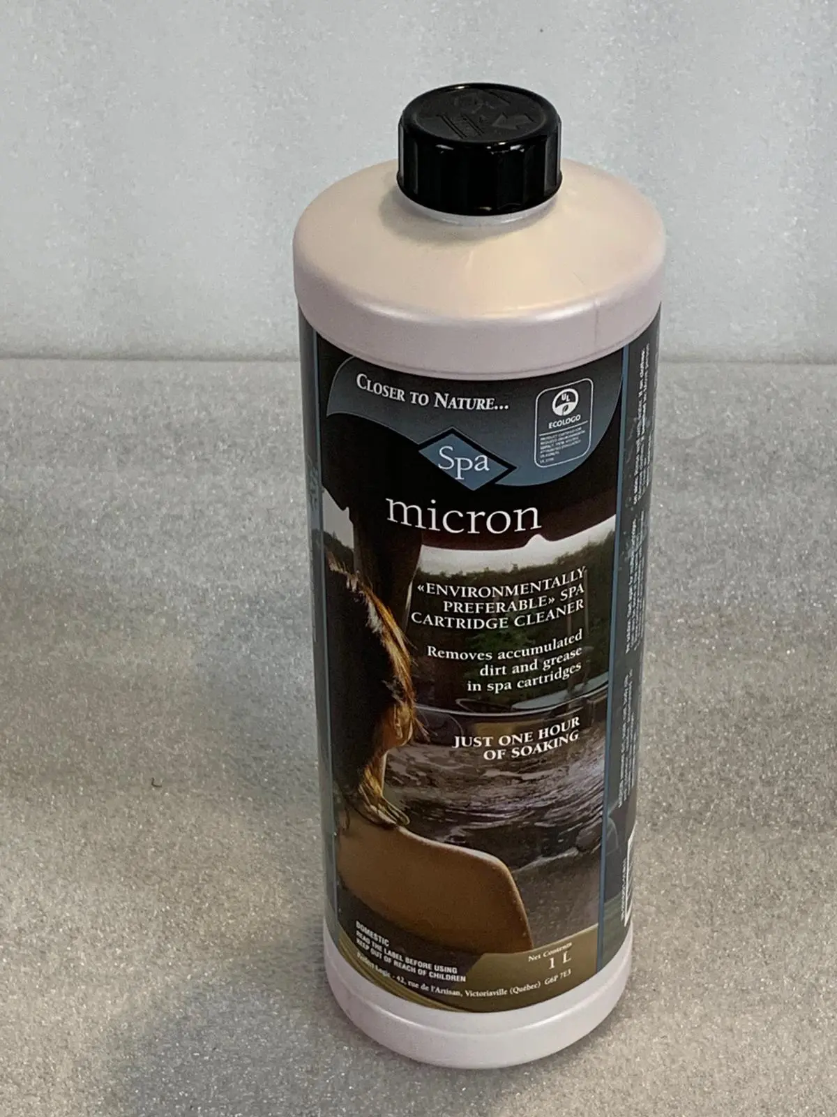 A bottle of micron is sitting on the counter.