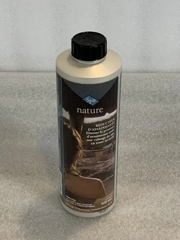 A bottle of car wash soap sitting on top of a counter.