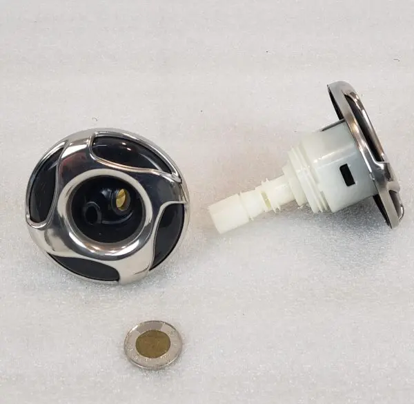 A close up of the bottom of a faucet