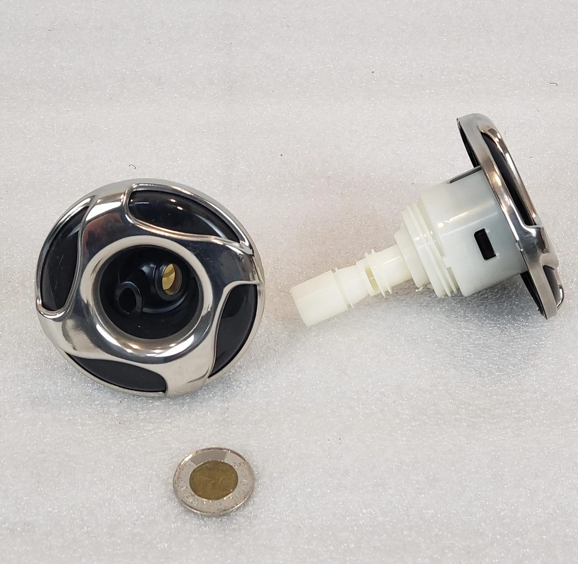A close up of the bottom of a faucet