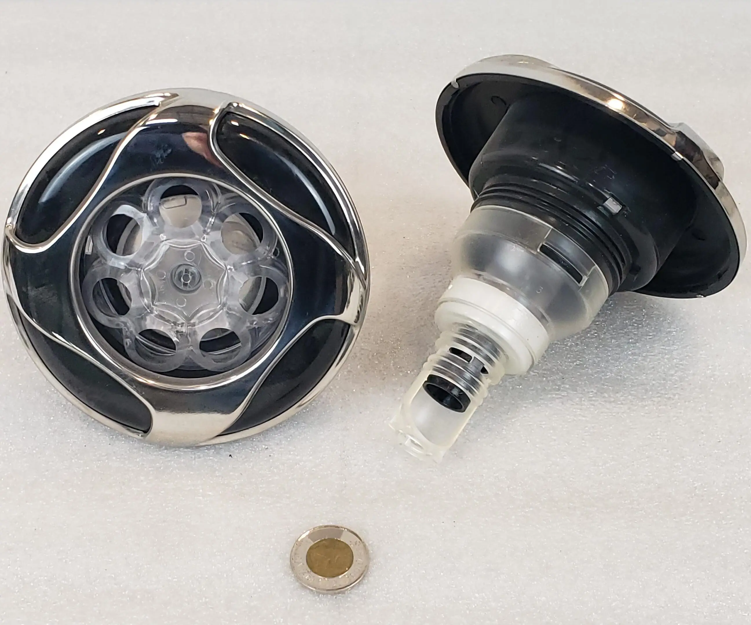 A close up of a bottle cap and a small bottle