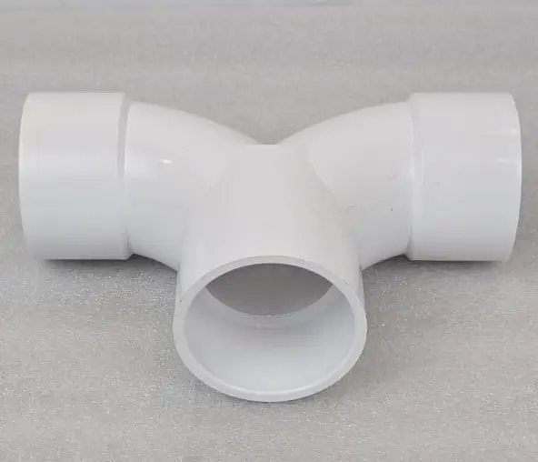 A white pipe sitting on top of a table.