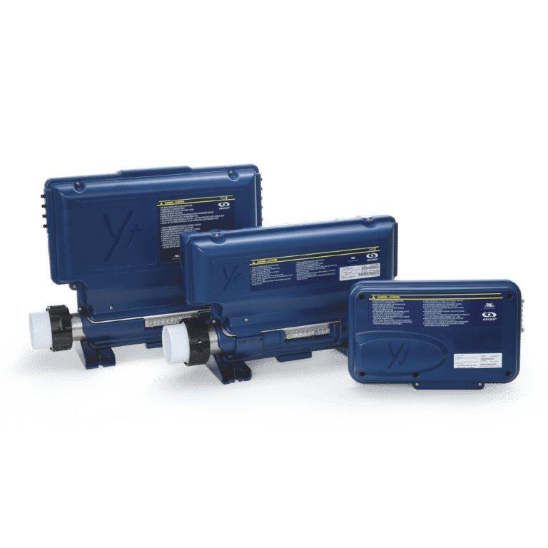 Picture April 1st Spa controllers A group of three blue boxes on top of a table.